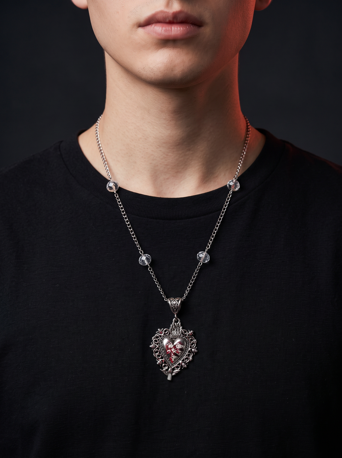 Sacred Heart Necklace worn over a black tee